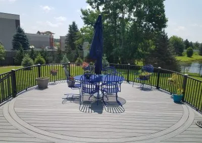 rounded composite deck with seating area