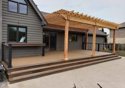 two-toned composite deck and pergola build