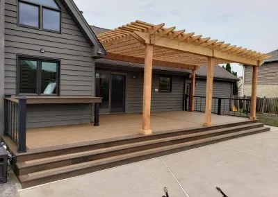 two-toned composite deck and pergola build