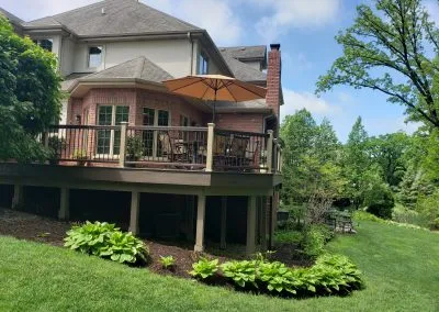 composite deck with two-tone railing and posts