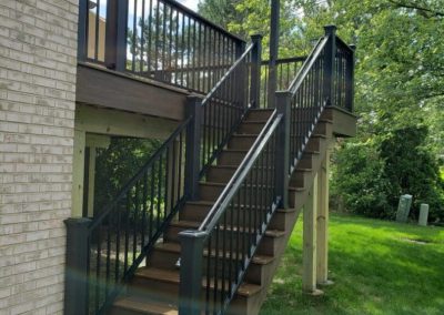 second story deck with pergola and stairway
