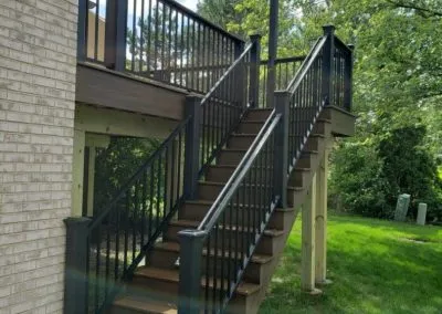 second story deck with pergola and stairway
