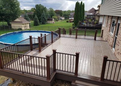 large composite above ground pool deck build