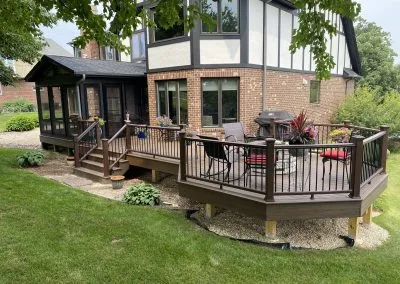Custom Composite Deck with Built-In Fire Pit and Screened-In Room