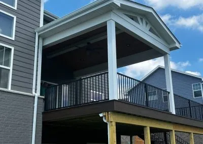covered composite second story deck, attached pavilion with roof extension