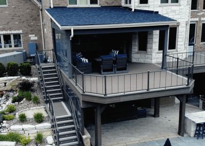 covered composite deck outdoor living space with roof extension