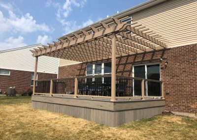 composite deck with pergola and two-toned railings