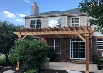 Large custom-built pergola over patio