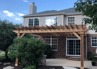 Large custom-built pergola over patio