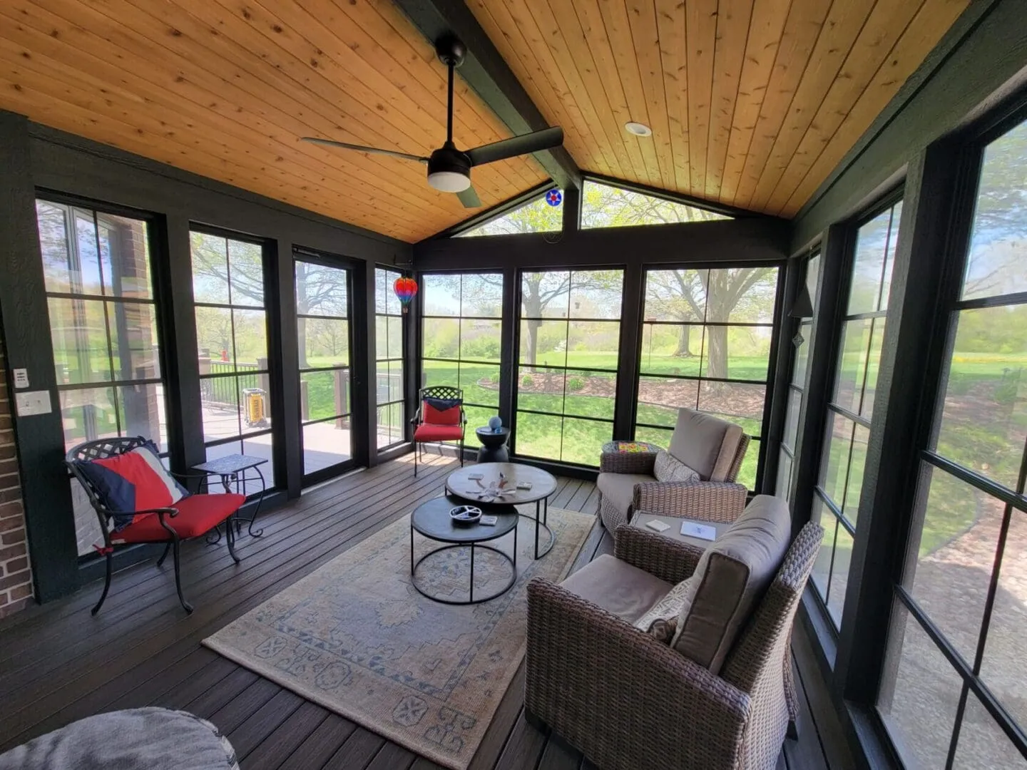 Screened in Room with Composite deck and wood accent ceiling